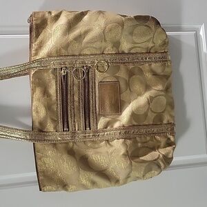 Gold coach bag